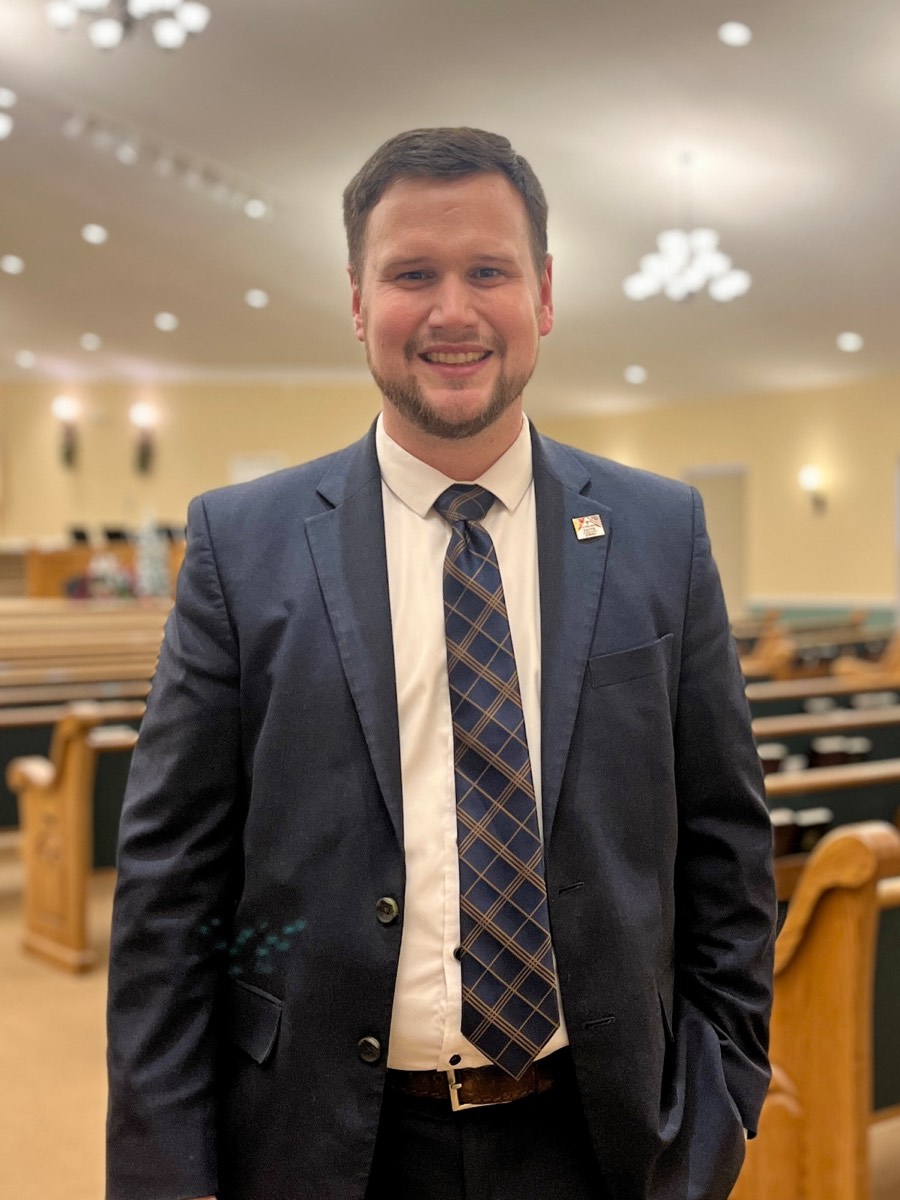 Steven Wireman, standing in the sanctuary at Faith Baptist Church in Chelsea